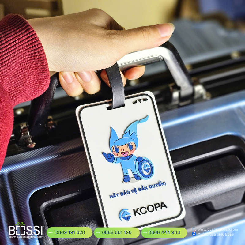 Đồng hồ quảng cáo T30 in logo Bobby Unicharm Tag Treo Vali In Logo KCOPA